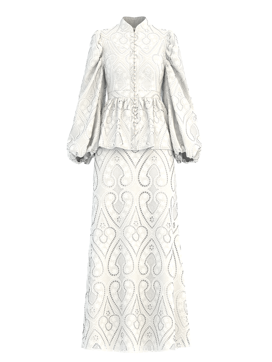 The Zora Opal is our classic statement piece made with love in the Cemile embroidery eyelet fabric in self-covered button-down delight, leading to a high-waist panel, while the neckline is accented with a mandarin collar.