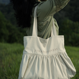 The Signature Dress Bag