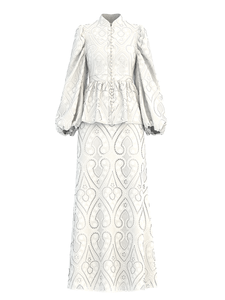 The Zora Opal is our classic statement piece made with love in the Cemile embroidery eyelet  fabric in self-covered button-down delight, leading to a high-waist panel, while the neckline is accented with a mandarin collar. 