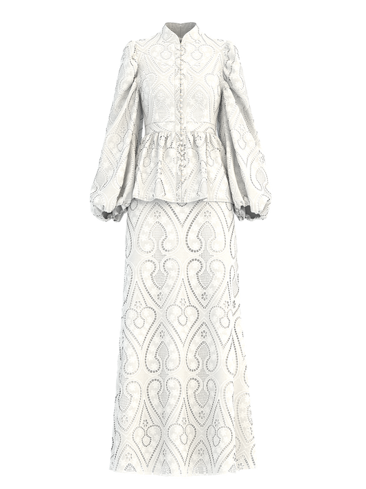 The Zora Opal is our classic statement piece made with love in the Cemile embroidery eyelet  fabric in self-covered button-down delight, leading to a high-waist panel, while the neckline is accented with a mandarin collar. 